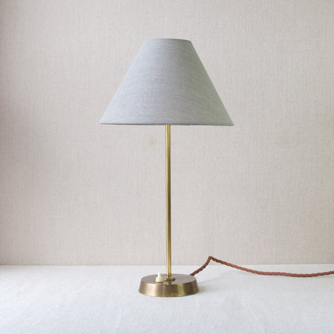 Profile image. Elegant Scandi brass table light inspired by Louis Poulsen, featuring subtle vintage Nordic design elements.
