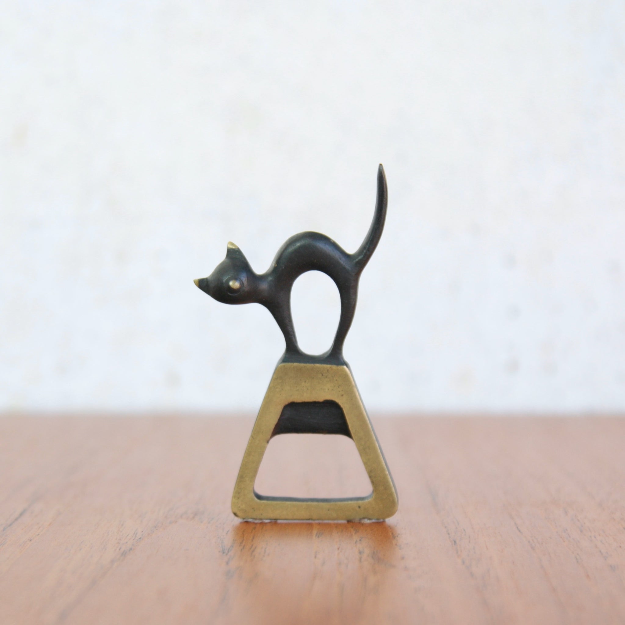 Mid-century modern black cat bottle opener by Walter Bosse, handmade in the 1950s by Baller Austria.
