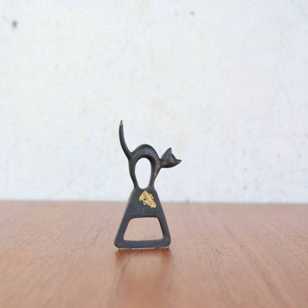 Mid-century Walter Bosse bottle opener in the form of a sculptural black cat, manufactured by Baller Austria.