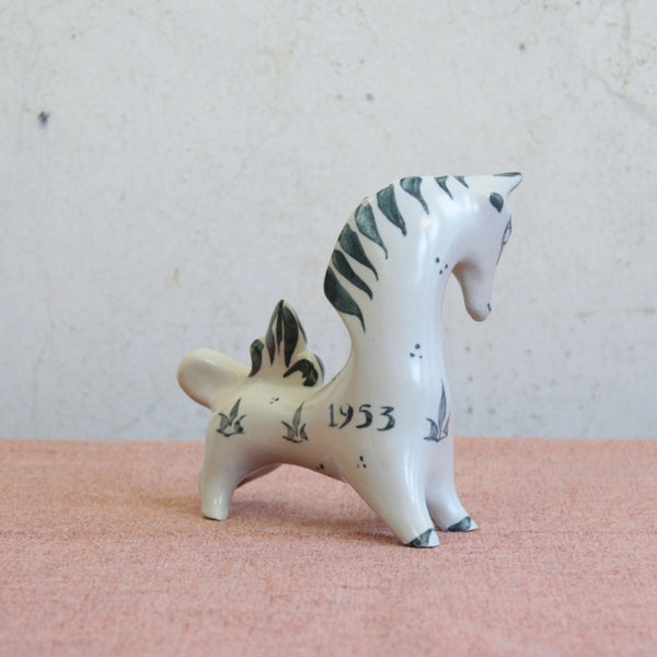 A striking Modernist unicorn figurine by Susan Parkinson, handmade in England, circa 1951. Rare post-war British studio pottery.