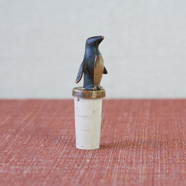 Side angle of a small cute little penguin figurine. This cast brass Vienna bronze was designed by Walter Bosse for Herta Baller in the 1950s.