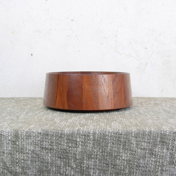 Head on shot, Danish modern teak fruit bowl by Jens Quistgaard for Dansk. Beautifully lathe-turned with clean mid-century lines and warm tone.
