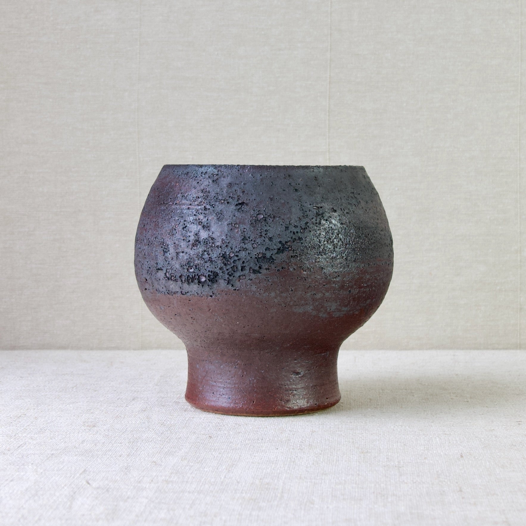 Liisa Hallamaa Arabia studio vase with Chamotte clay. An organic, natural aesthetic with highly textured organic surface.