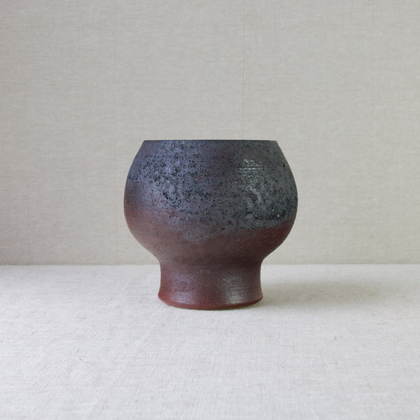 Brown chamotte vase designed by Liisa Hallamaa, Arabia, Finland. A handmade and unique object from 1960's with highly textured glaze. 