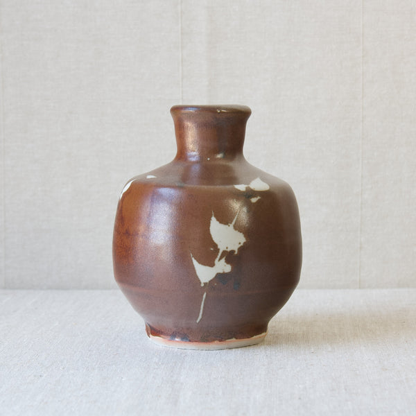 Handmade rustic interior decoration vase by Jim Malone, British studio ceramics from Cumbria. Brown Kaki glaze, wax resist decoration.