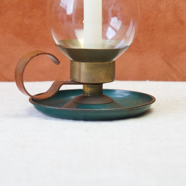 Steel enamelled candle holder in the bauhaus style designed by Marianne Brandt for Ruppel, 1930, showing geometric forms and handmade elements.