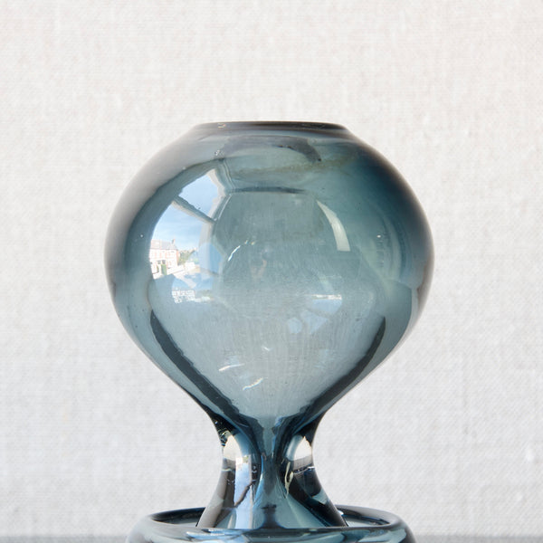 Detail of bulbous body of steel blue cased glass Porriainen vase designed by Nanny Still for Riihimaen Lasi Oy Finland