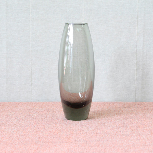 Sleek vintage 1950’s Per Lütken 'Hellas' 'Torpedo’ Vase. Hand blown in organic Modernist “Smoke” grey coloured glass, mid-century Danish design for Holmegaard glassworks. For sale in the UK.