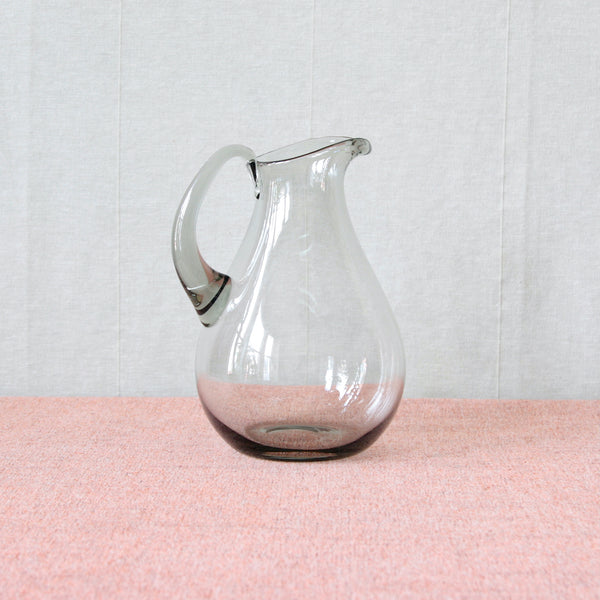 Vintage 1950’s Danish Per Lütken ‘Iceland’ pitcher jug in green-grey “Smoke" coloured glass, mid-century modern teardrop-shaped body with attached handle and rounded bottom.