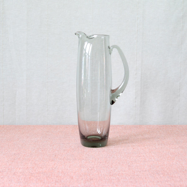 Tall and elegant vintage 1950’s 'Roskilde' Mixing Jug in organic Modernist “Smoke” grey coloured glass, designed by Per Lütken for Holmegaard glassworks.