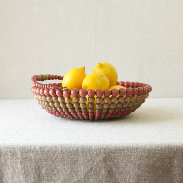 Retro 1960's wooden fruit bowl styled with lemons