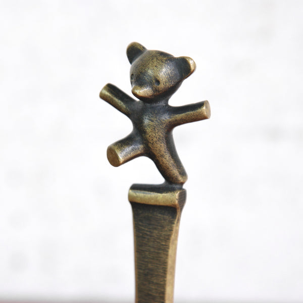 Brass bear cub letter opener, Walter Bosse design, handmade by Herta Baller, Austria, c.1950. Rare collectible for sale via UK design gallery Art & Utility.