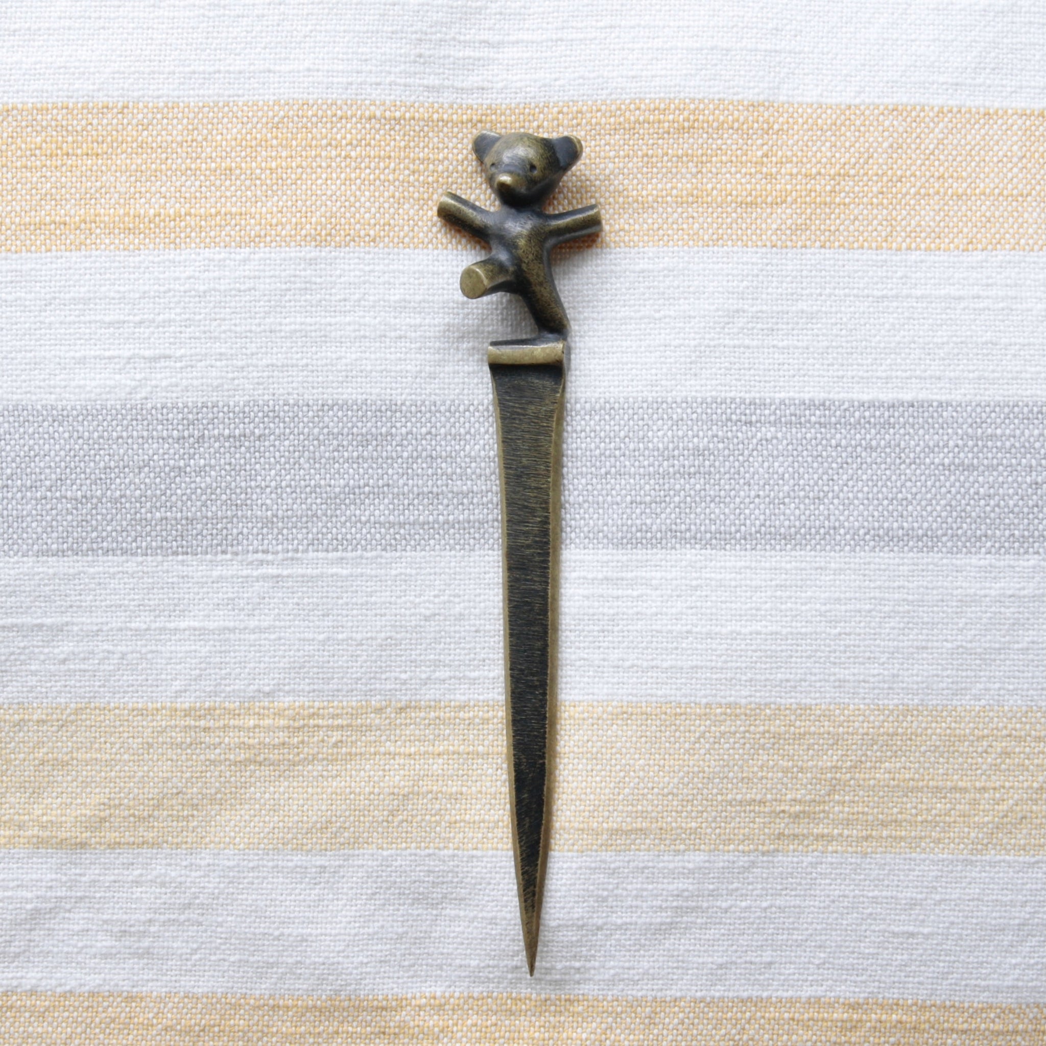Exquisite Bosse & Baller brass letter opener, dancing bear cub design, made in Austria c.1950. Find it at Art & Utility, specialists in rare Austrian Modernism.
