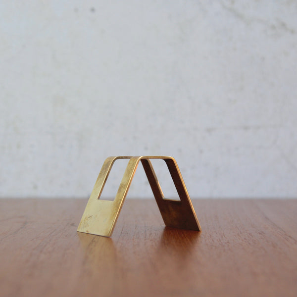 Decorative modernist brass business card holder by Karl Hagenauer, mid-century design.