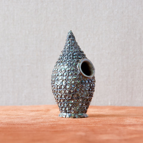 Lead image of a 'Rokko Art' bud vase or pen holder with heavy pebbledash like texture made by Guy Sydenham at his Mermaid Studio on Portland, UK, in 2000.