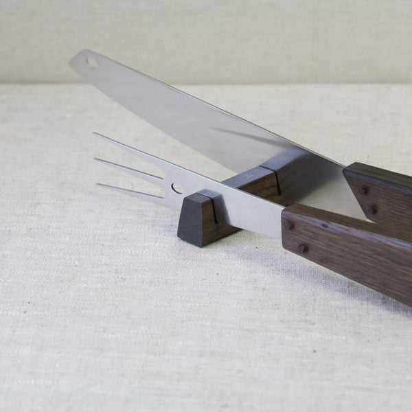 Image showing the bright shiny stainless steel prongs and blade on the fork and knife that make up this carving set by Tapio Wirkkala. This design and many other MidCentury Modern design items are for sale in London from Art & Utiltiy.