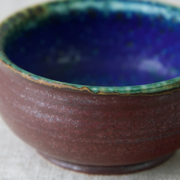 Modernist studio ceramic bowl by Anja Juurikkala, Arabia, Finland. Detail of different glazes. 