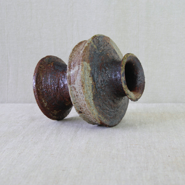 Annikki Hovisaari sculptural vase for Arabia Finland, a bold handmade ceramic with an unusual architectural form and richly textured brown glaze.