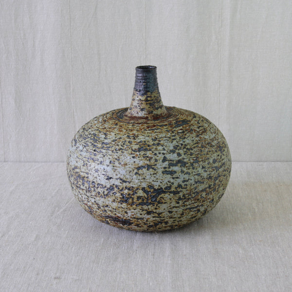 Annikki Hovisaari bulbous stoneware vase, its substantial rounded body rising into a narrow tapering neck with an almost archaic vessel form.