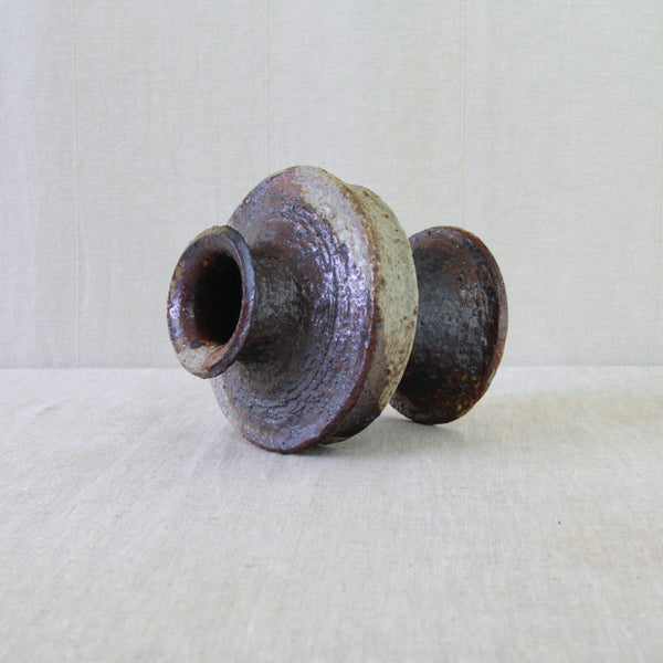 Architectural studio ceramic by Annikki Hovisaari, constructed from separately thrown sections to create its distinctive geometric silhouette.