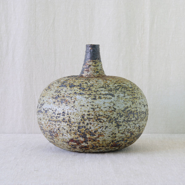 Annikki Hovisaari vase with an archaic vessel form, combining a bulbous body and narrow neck with distinctly Modernist handling.