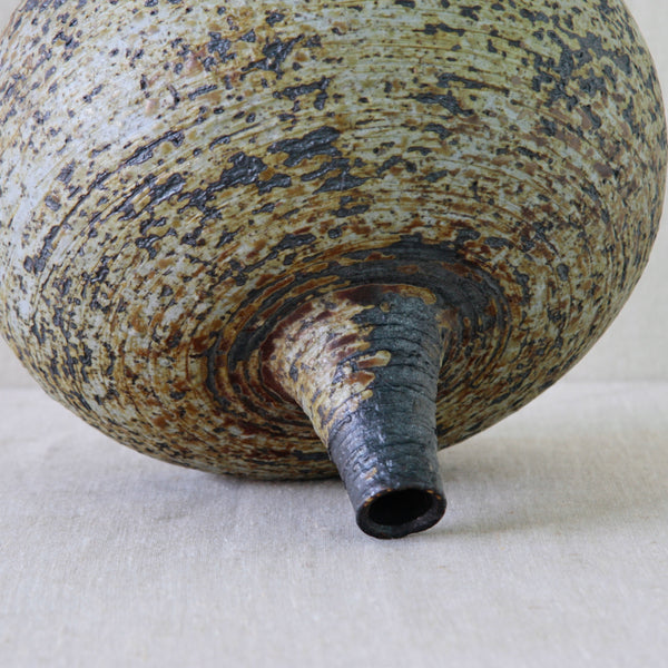 Large sculptural stoneware vase handmade at Arabia Finland by Annikki Hovisaari, with a bulbous profile and richly textured chamotte clay.