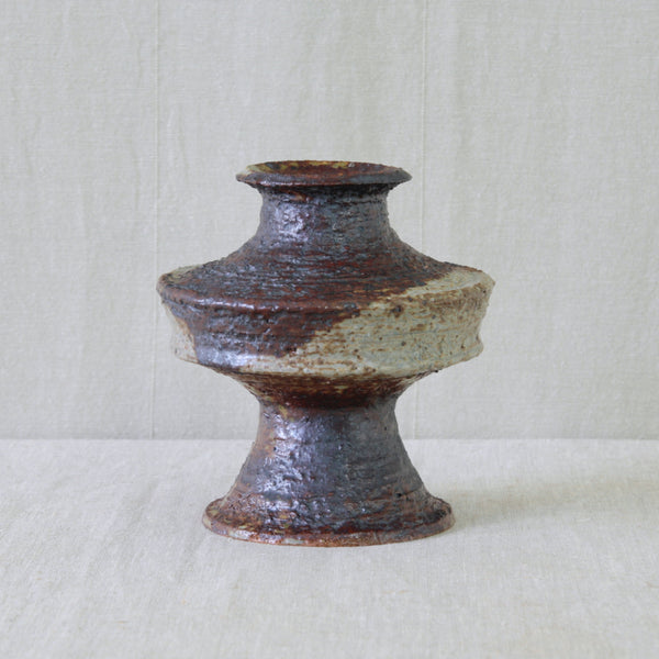 Modernist ceramic vase by Annikki Hovisaari for Arabia, Finland, circa 1965, with an architectural form and richly worked surface.
