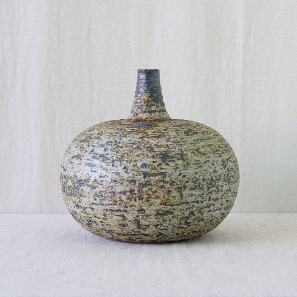 1960s Finnish Modernist ceramic by Annikki Hovisaari for Arabia, balancing a fundamental vessel form with experimental surface treatment.