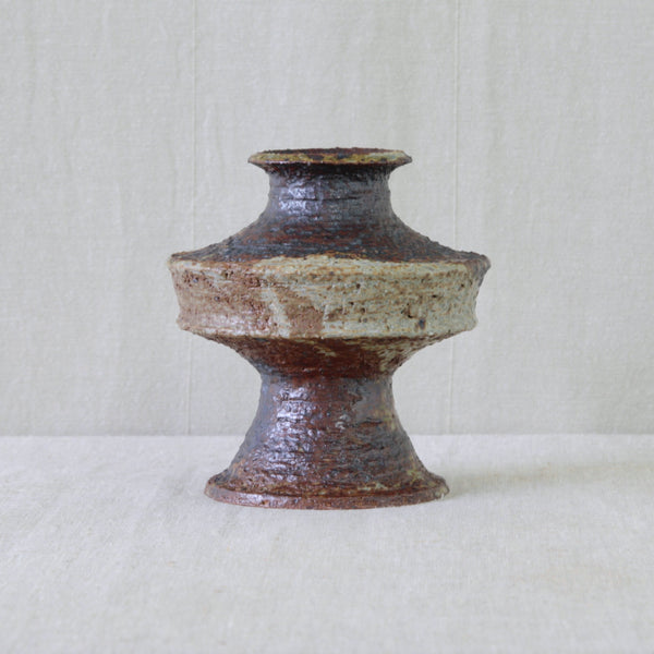 1960s Finnish studio ceramic by Annikki Hovisaari, combining Space Age design with earthy chamotte clay and iron-rich glaze.