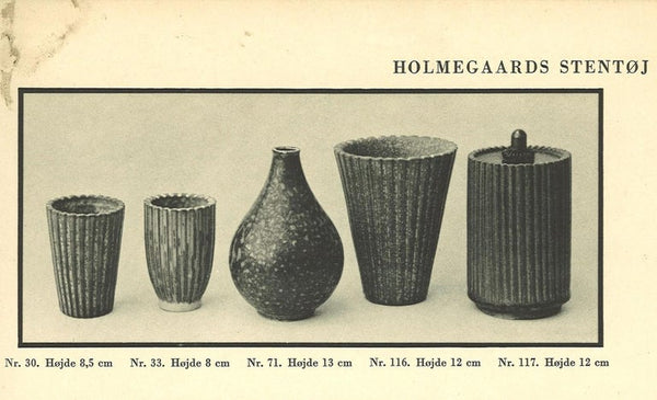 Original advertisement showing five Arne Bang ceramic vessels including model number 71 (central).