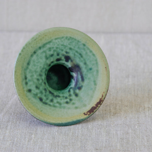 Liisa Hallamaa Space Age candleholder for Arabia Finland, with an exaggerated flared rim and contrasting brown, green and yellow glazes.