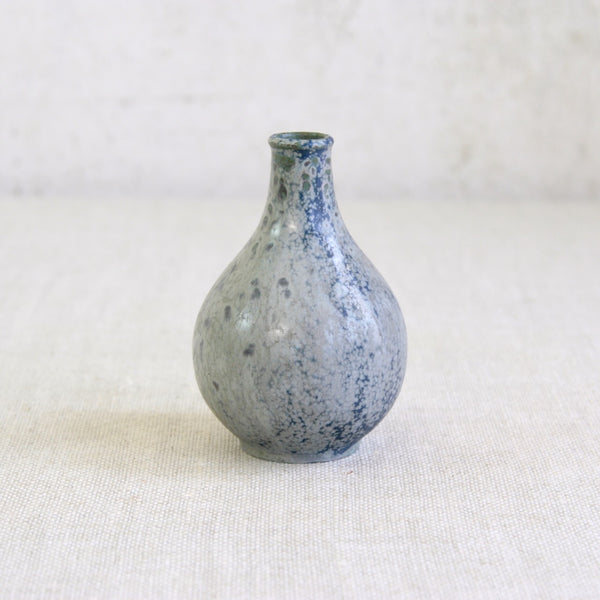 Top down view of a stoneware vase by Arne Bang displaying mottled blue, grey, and green glaze. A superb example of an important early Danish Modernist design.