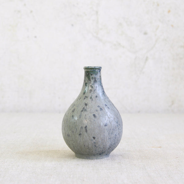 Mid-20th-century Danish ceramic vase by Arne Bang showing nuanced grey-blue glaze profile and organic Modernist form. Rare and collectible Nordic design for sale in the UK.