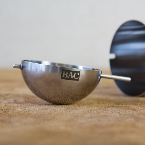 Stelton Modernist ashtray with polished steel finish and rotating top with Danish company "BAC"