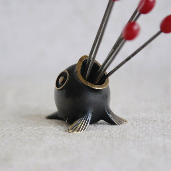 Vintage Richard Rohac brass fish toothpick holder, a rare modernist collectible with elegant Art Deco lines. For sale in UK from Art & Utility.