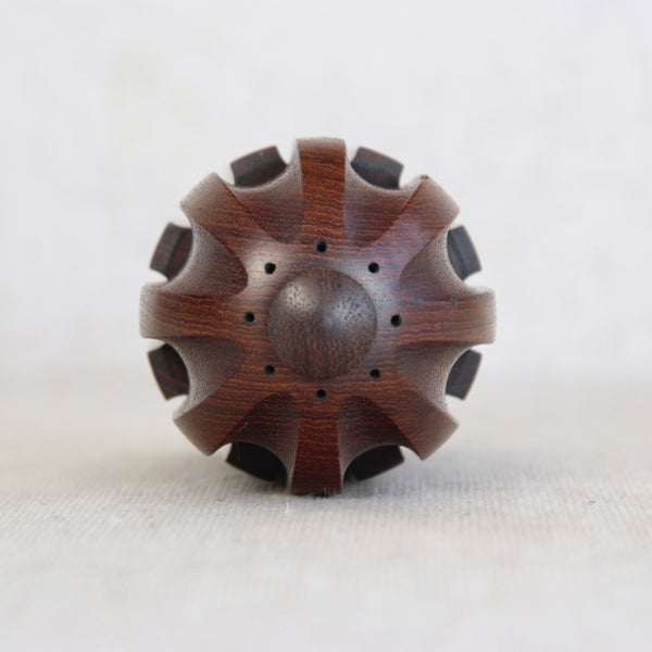 Artistic head-on shot os a Jens Quistgaard Model 858 “Bullet” pepper mill for Dansk Designs, Denmark, circa 1965.