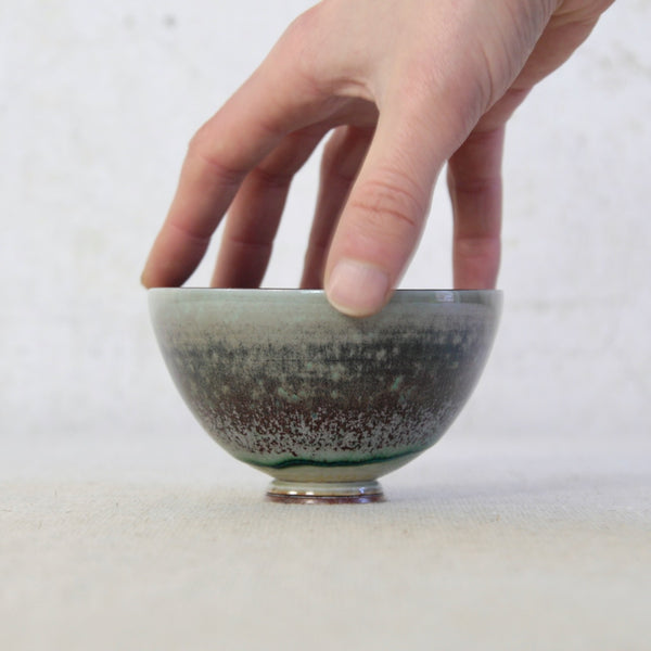 Collectable Berndt Friberg porcelain bowl in deep aubergine with galaxy-inspired glaze; premium Scandinavian Modernist design, for sale in the UK to all international buyers.