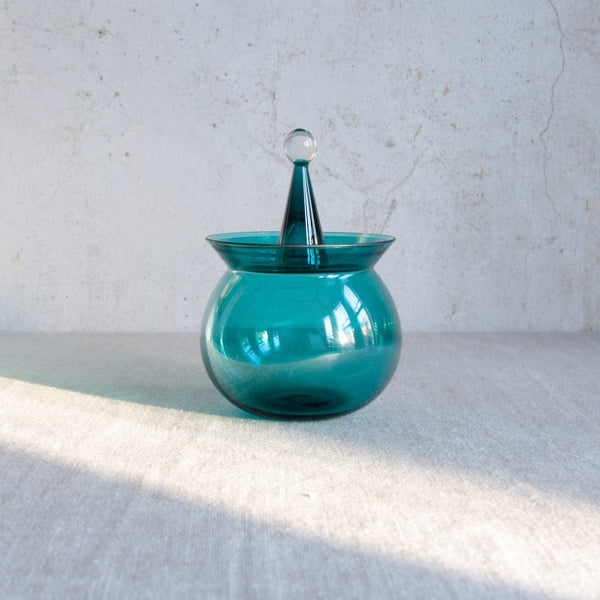 Turquoise glass Mid-century Scandinavian bowl from the Harlekiini series, designed by Nanny Still for Riihimäen Lasi. For sale in the UK from Nordic design gallery Art & Utility.