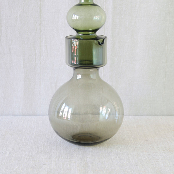 Detail of base of a Kaj Franck Kremlin Bells decanter and pitcher showing the ingenious stacking arrangement of the two separate glass vessels.