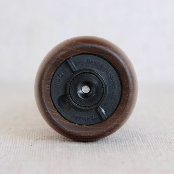 Underside / base of a collectible Nordic mid-century pepper mill 879 by Jens Quistgaard for Dansk Designs. This vintage design is fully marked with the makers stamps.