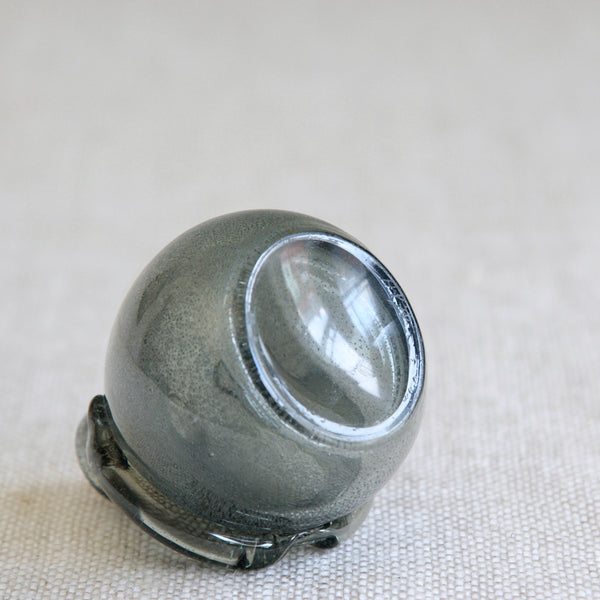 Underside of an early spherical bottle vase in human form designed by Erik Höglund and produced by Boda, Sweden, early 1950s, representing a formative stage in his celebrated People series. Base is signed.