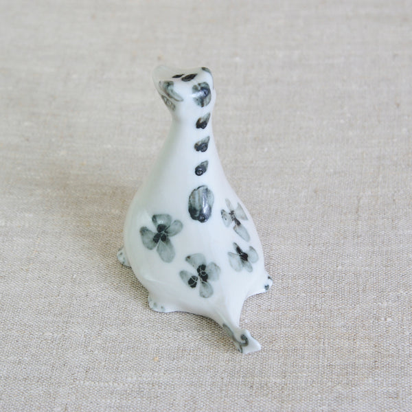 Top down view. Post-war British studio pottery, Susan Parkinson Nessie with characteristic curls and sgraffito decoration.