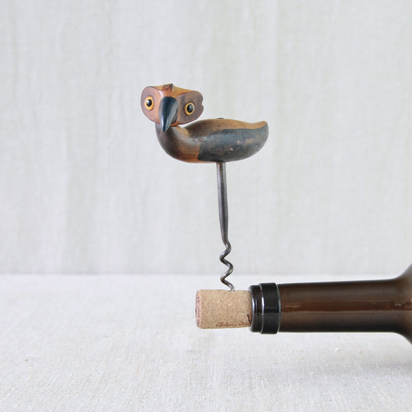 YZ bird corkscrew designed by Bernard Charles Howell for Henry Howell & Co. in 1925, with rattan head, carved wood body and Bakelite beak.
