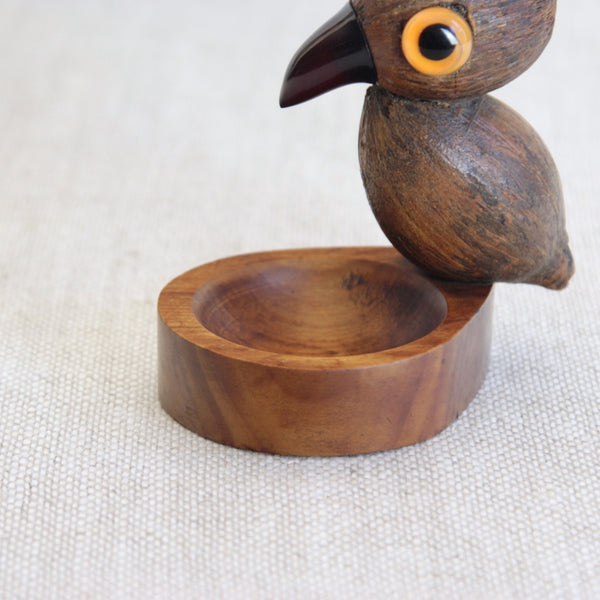 Art Deco YZ bird vide poche made with Brazilian coquilla nut, mahogany wood and Bakelite, designed by Bernard Charles Howell.