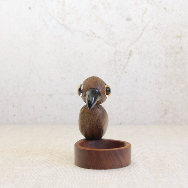 Bernard Charles Howell YZ nut bird vide poche, an iconic Art Deco desk accessory made from mahogany, coquilla nut, Bakelite and glass.