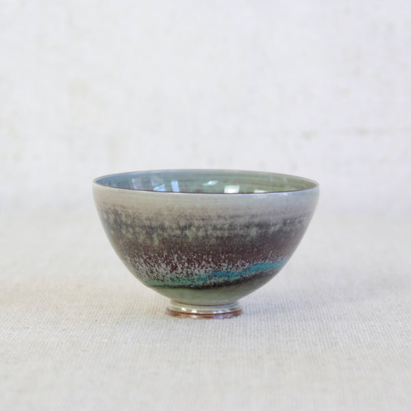 Exquisite Friberg porcelain bowl for Gustavsberg with speckled green-grey interior; sought-after Scandinavian studio pottery for global collectors.