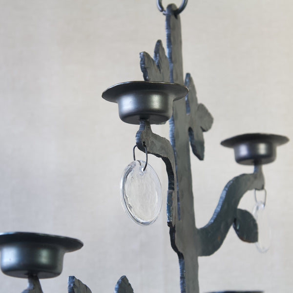 Detail of metal candle sconce with dangling glass beads, Bertil Vallien