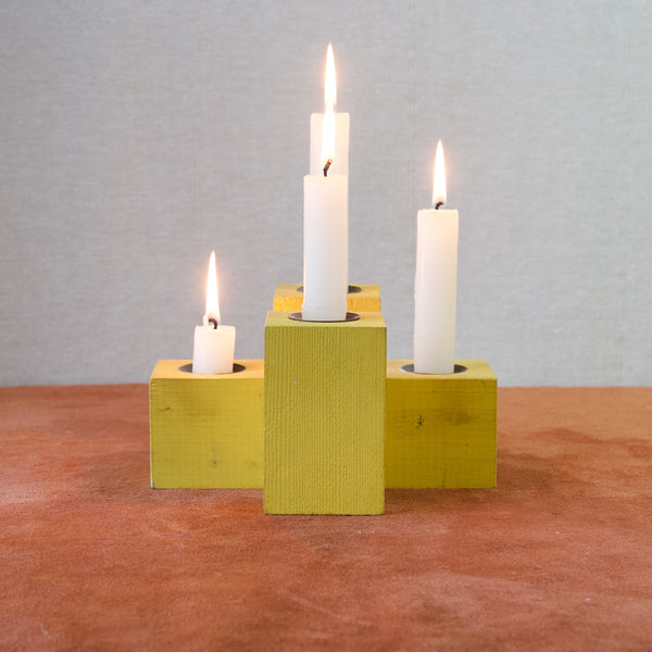 Geometric colourful yellow wooden candle holder by Erik Höglund, handmade from Swedish pine