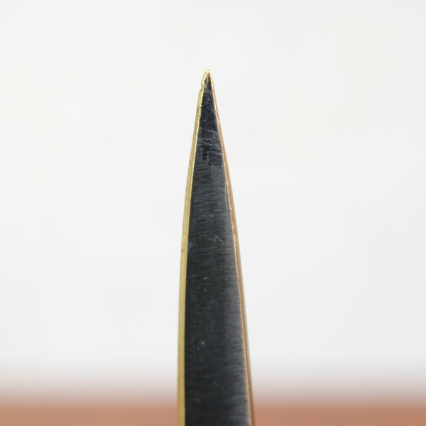 Close up of the tip of a Walter Bosse letter opener. This is one of many Herta Baller made designs available for sale in the UK from design gallery Art & Utility.