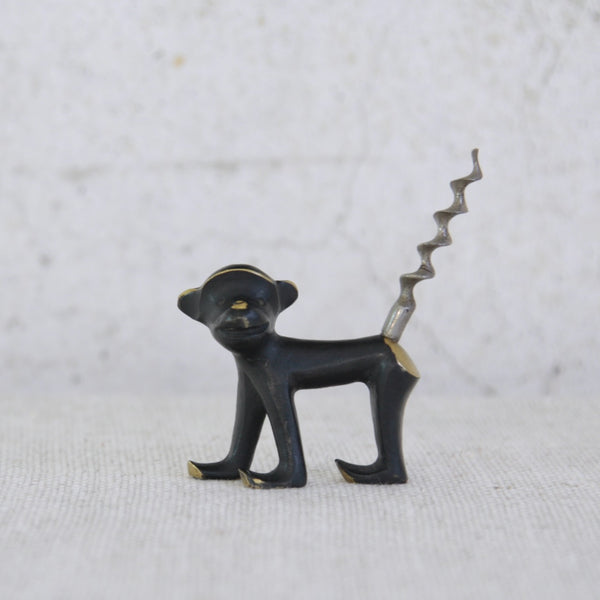 Vintage 1950s Walter Bosse monkey corkscrew by Herta Baller — a playful mid-century brass collectible with black-golden patina, perfect for barware and design lovers.